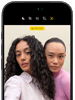 iPhone 18 Pro, black, front exterior, displaying two models posing for the camera, demonstrating the Center Stage front camera